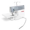 Knee lift on the Bernina L850 Overlocker image also shows the extension table